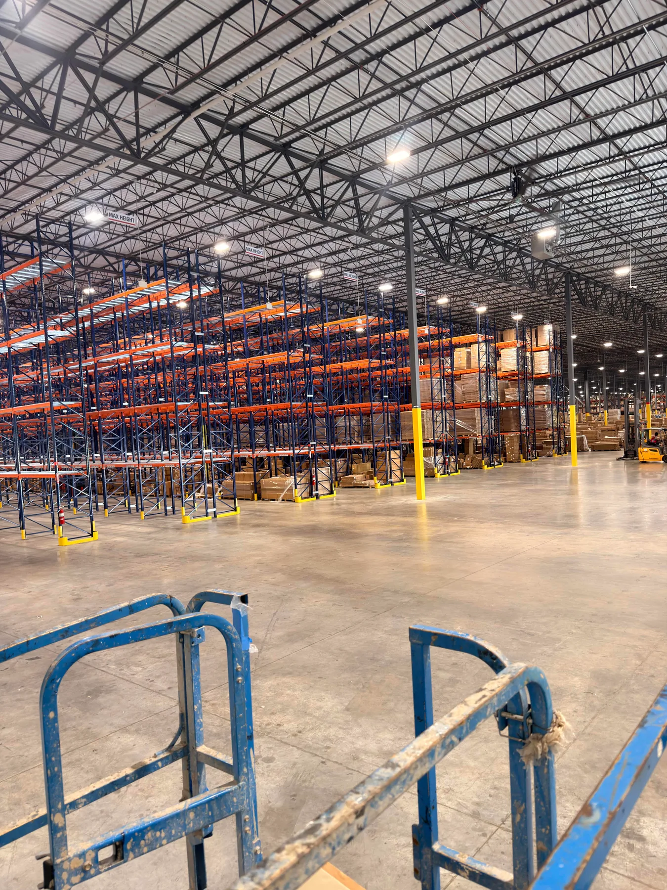 Lighting and storage aisles inside a warehouse